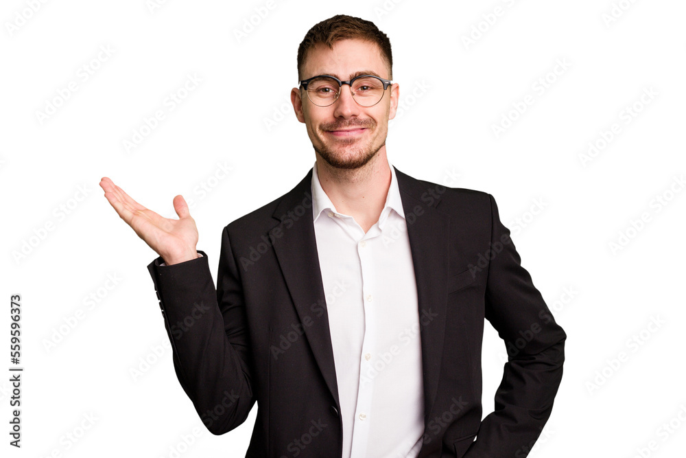 Young caucasian business man cutout isolated showing a copy space on a palm and holding another hand on waist. Young caucasian business man cutout isolated showing a copy space on a palm and holding another hand on waist.