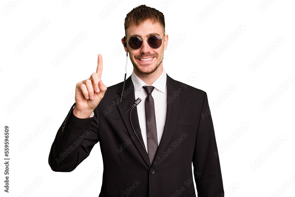 Security bodyguard man wearing a suit isolated cut out showing number one with finger. Security bodyguard man wearing a suit isolated cut out showing number one with finger.