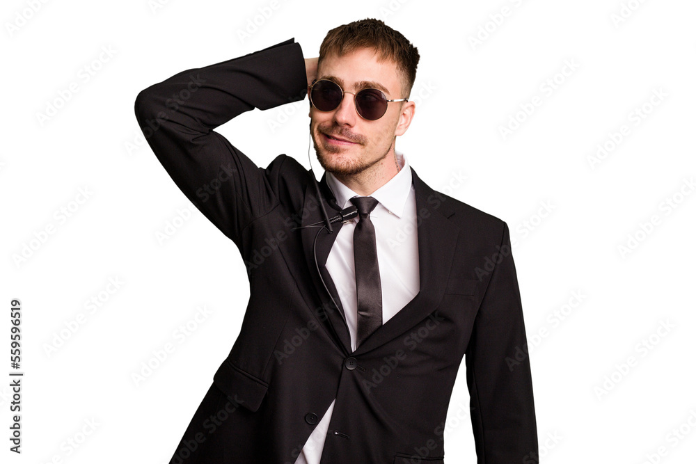 Security bodyguard man wearing a suit isolated cut out touching back of head, thinking and making a choice. Security bodyguard man wearing a suit isolated cut out touching back of head, thinking and making a choice.