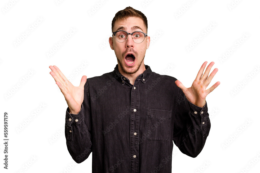 Young caucasian man cut out isolated celebrating a victory or success, he is surprised and shocked. Young caucasian man cut out isolated celebrating a victory or success, he is surprised and shocked.