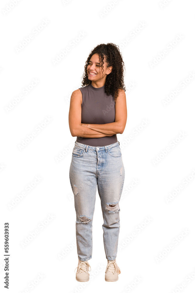 Young african american woman with curly hair cut out isolated smiling confident with crossed arms. Young african american woman with curly hair cut out isolated smiling confident with crossed arms.