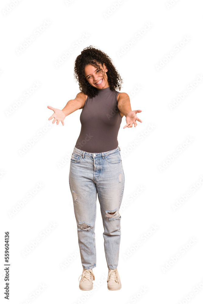 Young african american woman with curly hair cut out isolated showing a welcome expression. Young african american woman with curly hair cut out isolated showing a welcome expression.