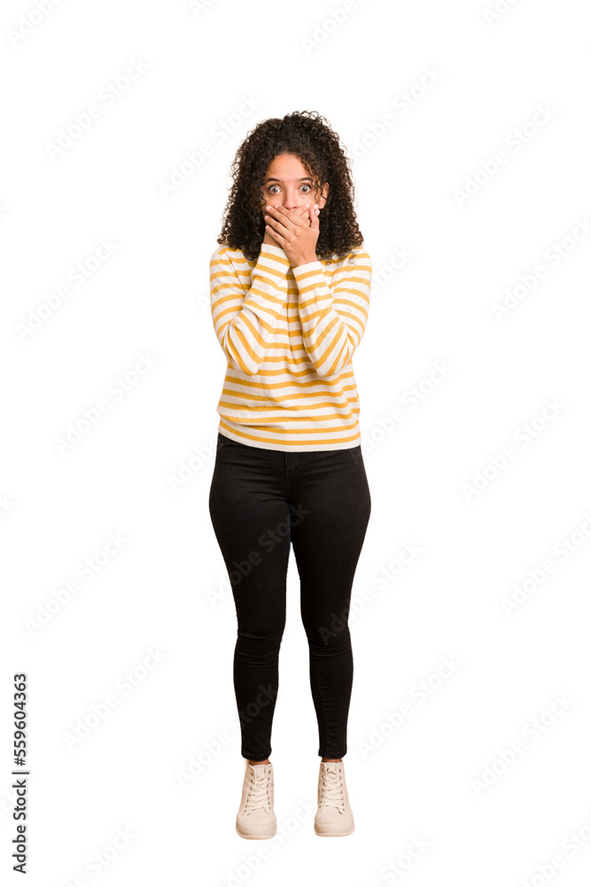 Young african american woman with curly hair cut out isolated covering mouth with hands looking worried. Young african american woman with curly hair cut out isolated covering mouth with hands looking worried.