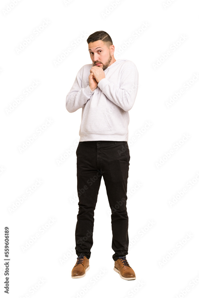 Full body adult latin man cut out isolated scared and afraid. Full body adult latin man cut out isolated scared and afraid.