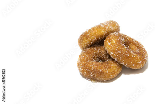 Lots of rosquillas, typical Spanish donuts. Isolated on white background. Spanish food concept.