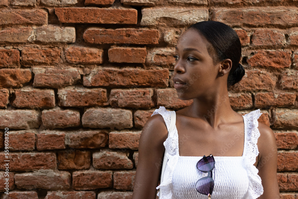 Portrait of turist woman dressed in white getting to know Europe, Ferrara. Italy Portrait of turist woman dressed in white getting to know Europe, Ferrara. Italy
