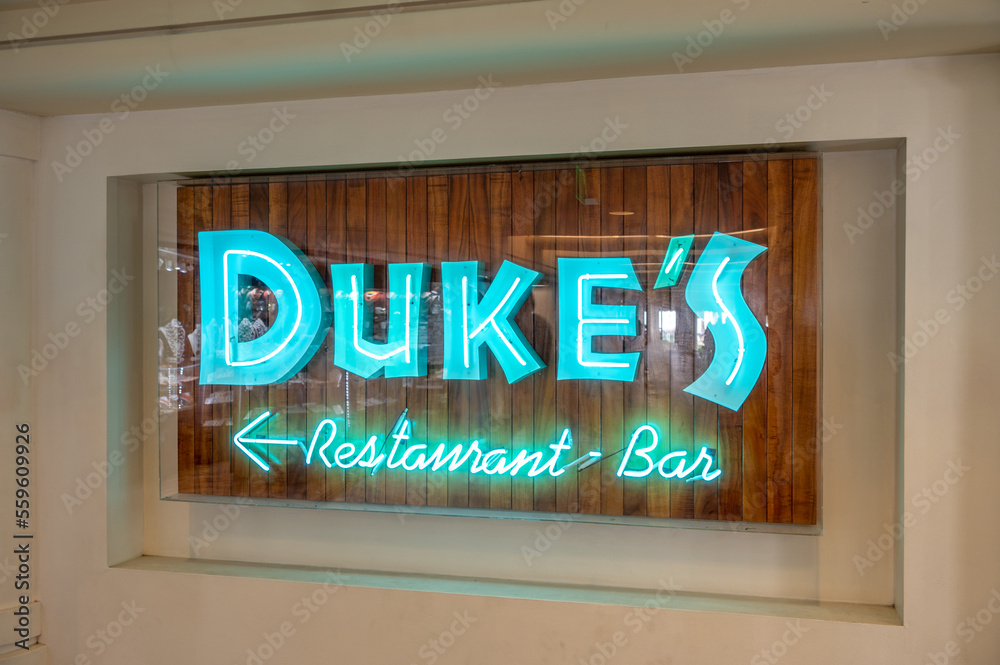 Honolulu, Hawaii December 31, 2022 Neon sign for the famous Dukes
