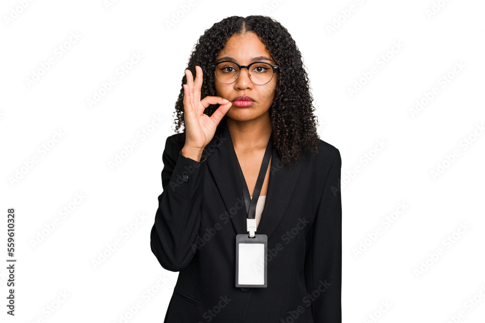Young african american business woman with ID card isolated with fingers on lips keeping a secret. Young african american business woman with ID card isolated with fingers on lips keeping a secret.