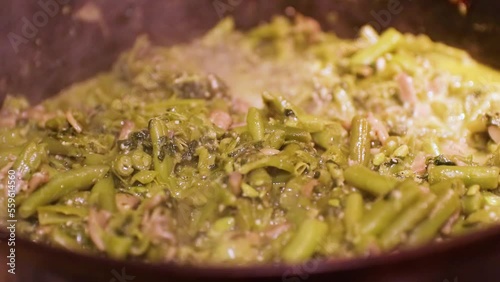 cooking delicious food in a frying pan