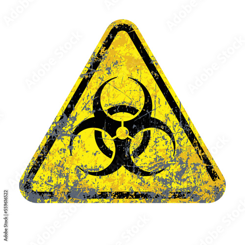 classic biohazard symbol distressed yellow triangle photo