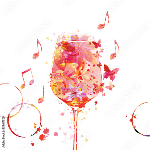 Elegant wine glass with flowers. Floral aroma wine in goblet with musical notes. Colorful stemware with alcoholic beverage for celebrations and special occasions. Degustation events.