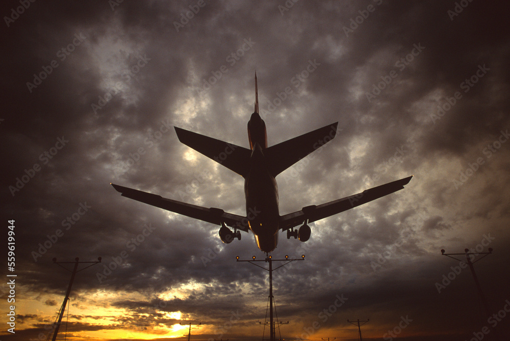 View of plane from underneath as it lands at LAX Airport in Los Angeles, CA. View of plane from underneath as it lands at LAX Airport in Los Angeles, CA.