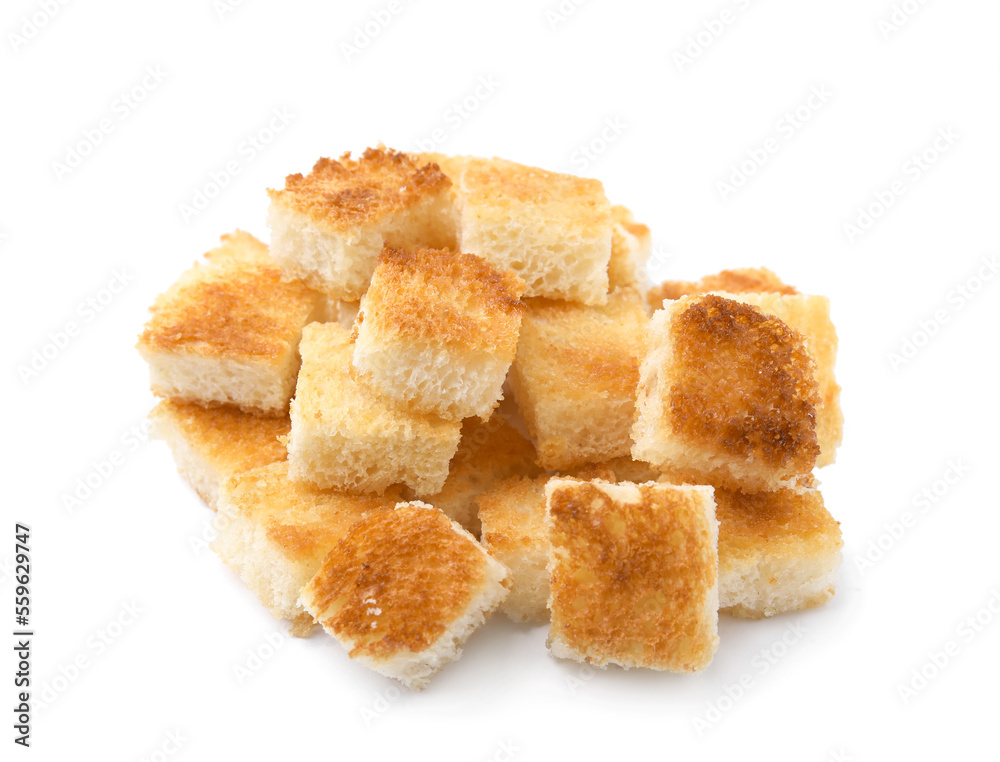 Pile of delicious crispy croutons on white background Pile of delicious crispy croutons on white background