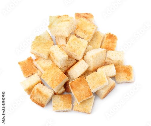 Delicious crispy croutons on white background, top view