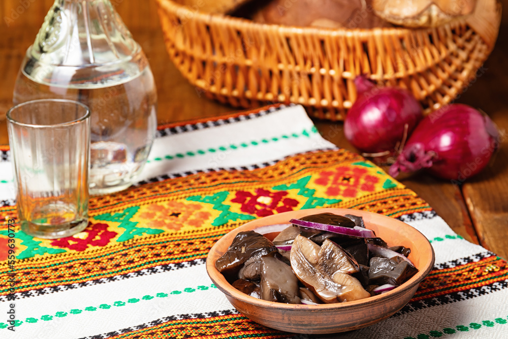 marinated mushrooms with spices and red onion.