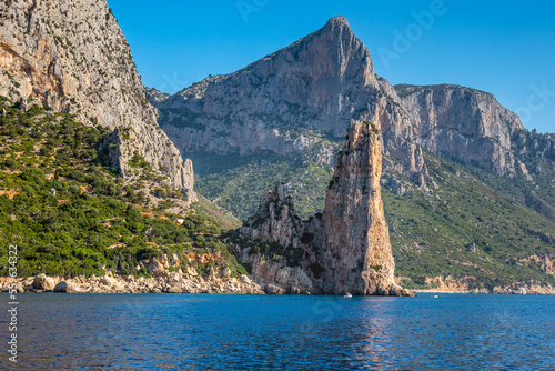 Sardinian seashore in the Baunei municipality with Pedra Longa cliff, Italy