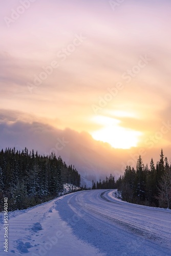 Sun Glowing Over Snow Covered Roads