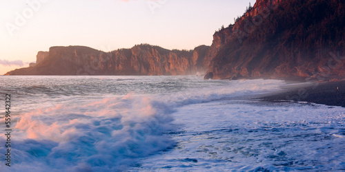 Morning sun shines over the rocky beach of Forillon National Park, No.4 photo