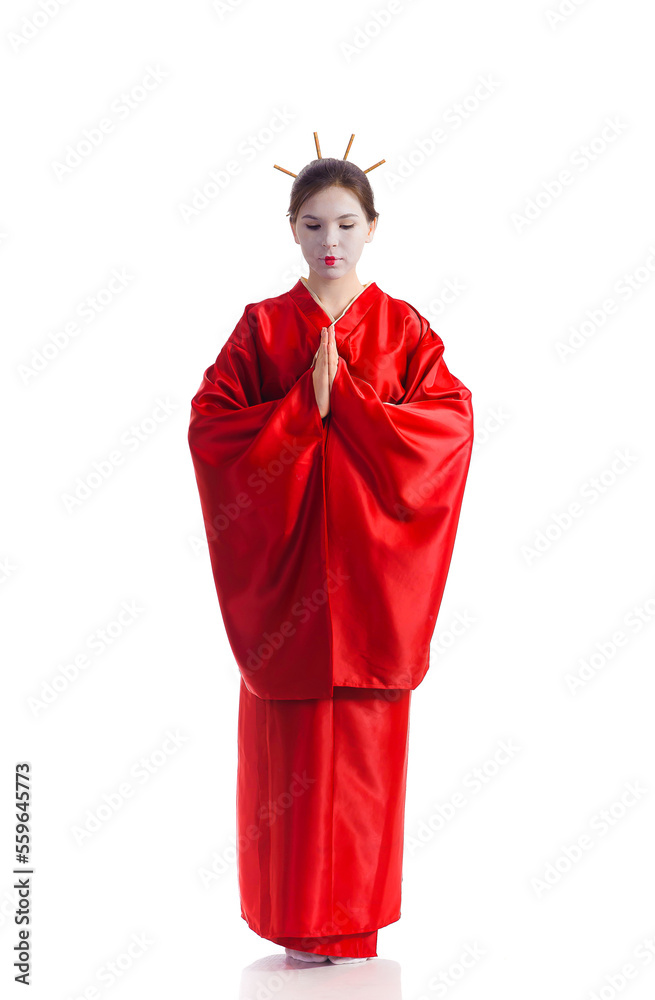 The girl in native costume of japanese geisha, isolated on white