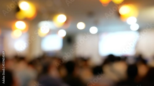 Blur background seminar business event in auditorium  hall convention audience presentation meeting at conference room present screen for entrepreneurs startup business. Blurred background copy space