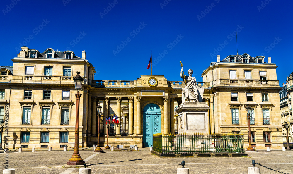 Bourbon Palace, the French National Assembly with the Law statue in Paris, France