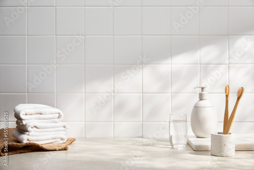 morning sunlight on modern white tile bathroom and bath object