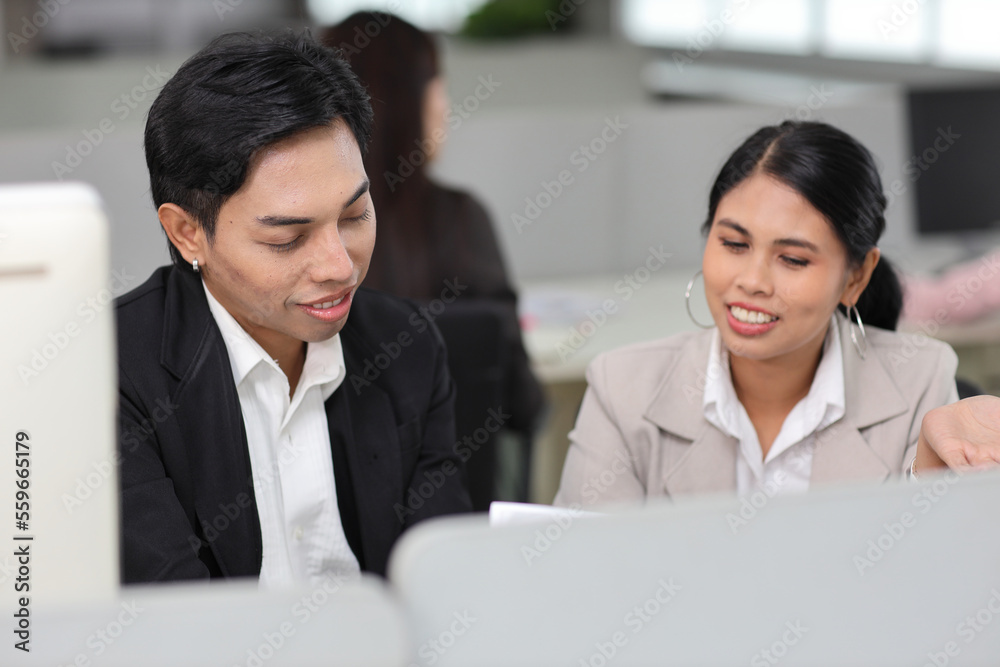 Business people gossiper group whispering or sharing rumor about their colleague in the office. Male coworker sitting and telling gossip to female workmate about bullying problem at work place. Business people gossiper group whispering or sharing rumor about their colleague in the office. Male coworker sitting and telling gossip to female workmate about bullying problem at work place.