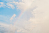 clear sky rainbow background fluffy white clouds