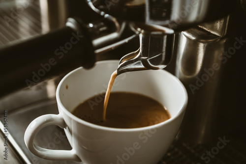 espresso machine in coffee shop counter offering freshly brewed coffee. coffee maker concept.