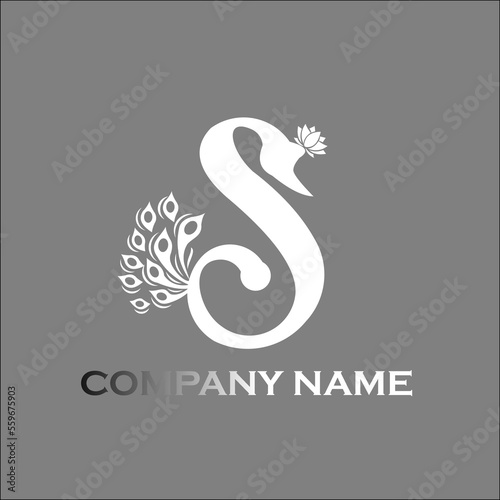 a logo with a mix of letters and animals, a swan and a peacock's tail, crowned with a lotus flower crown