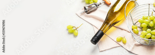 Obraz na płótnie Glasses and bottle with white wine on a white background.