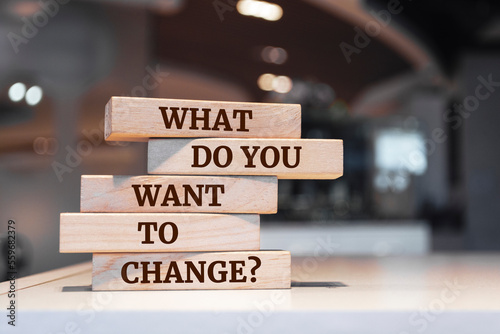 Wooden blocks with words 'What Do You Want to Change?'.