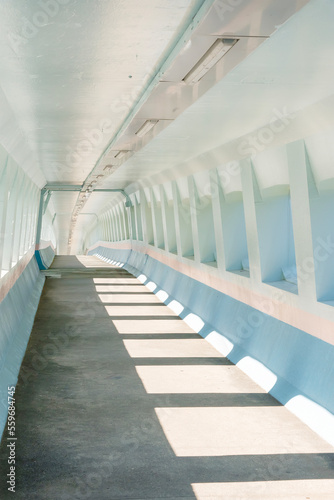 Interior view of empty modern pedestrian walkway © leeyiutung