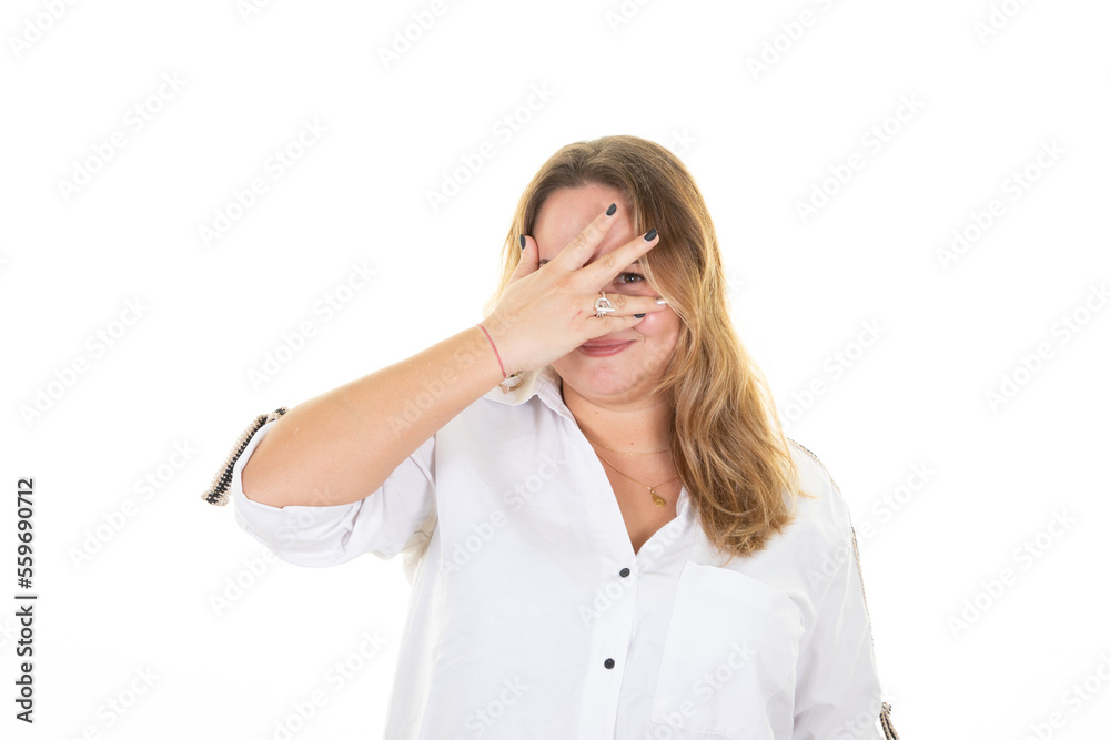 shy woman young chubby hiding behind hand palm portrait on white background studio shot shy woman young chubby hiding behind hand palm portrait on white background studio shot
