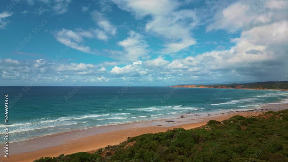 Great Ocean Road beach, Australia. Aerial drone near Twelve Apostles. Clear turquoise water, white sandy beach and jungle palm trees at seaside. Scenic, cinematic, idyllic nature documentary in 4K UHD Great Ocean Road beach, Australia. Aerial drone near Twelve Apostles. Clear turquoise water, white sandy beach and jungle palm trees at seaside. Scenic, cinematic, idyllic nature documentary in 4K UHD