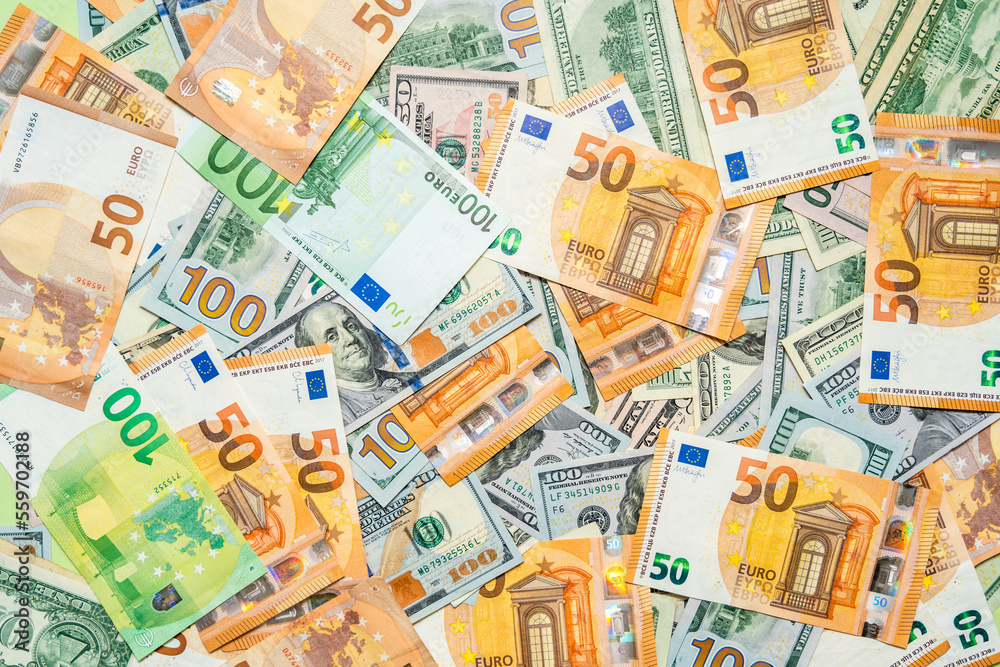 Money pile dollar and euro bills background