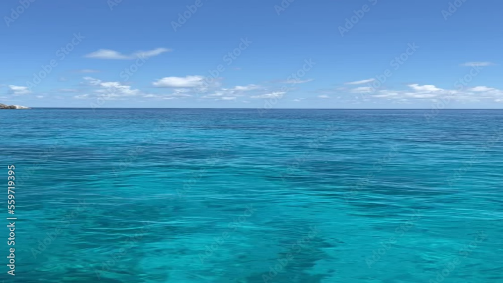 Tropical islands of ocean blue sea water and clear sky at Similan Islands from famous viewpoint, Phang Nga Thailand in a summer day Tropical islands of ocean blue sea water and clear sky at Similan Islands from famous viewpoint, Phang Nga Thailand in a summer day