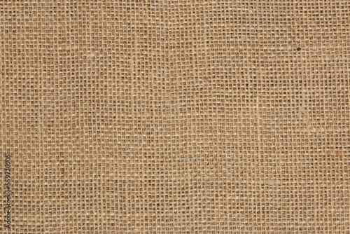 Hessian hemp burlap fabric background, natural material. Used for sacking and craft projects