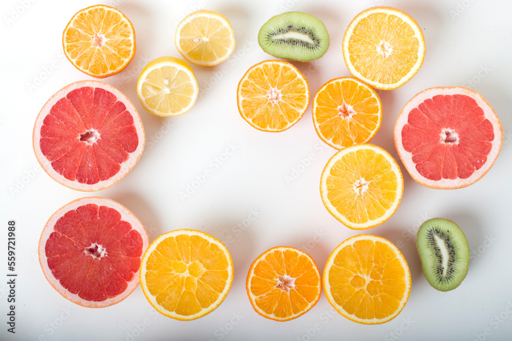 apple, grapefruit, pomegranate, orange, kiwi, tangerine, lemon on a white background.cut fruit. isolated. on a white background. apple, grapefruit, pomegranate, orange, kiwi, tangerine, lemon on a white background.cut fruit. isolated. on a white background.