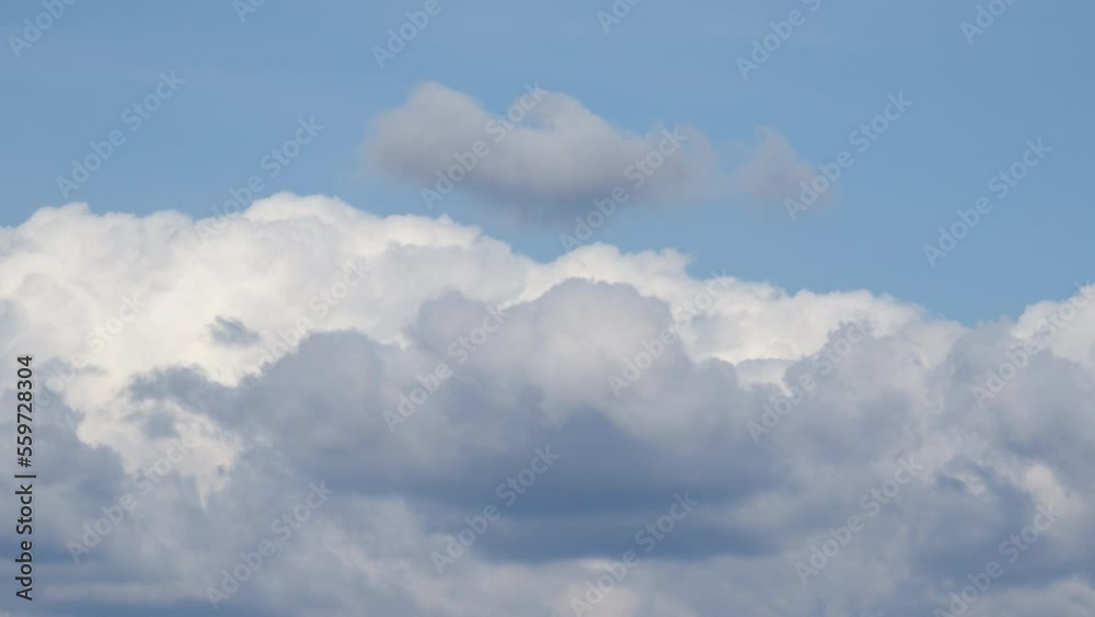 Clouds against the sunset sky. A time lapse of a cloudy sky. Beautiful sky background with clouds Clouds against the sunset sky. A time lapse of a cloudy sky. Beautiful sky background with clouds