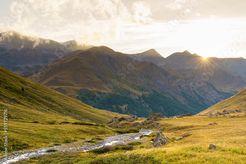 Wallpaper Mural A stunning sunset over the valley of Cervières, France. This photo captures the beauty of nature and the tranquility of the rural landscape.  Torontodigital.ca