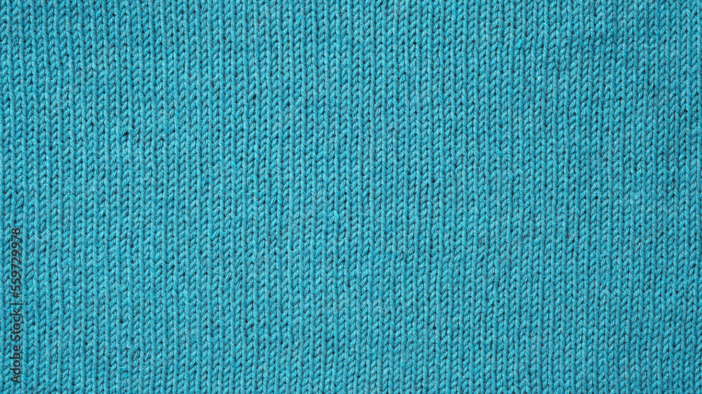 Knitted background. Texture of knitted cotton fabric close up. Knitted background. Texture of knitted cotton fabric close up.