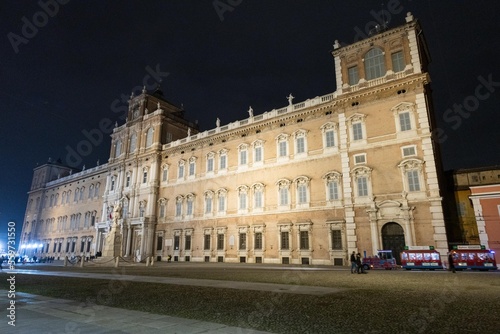 historic center of modena lit up at christmas with shop windows and shops decorated for christmas shopping photo