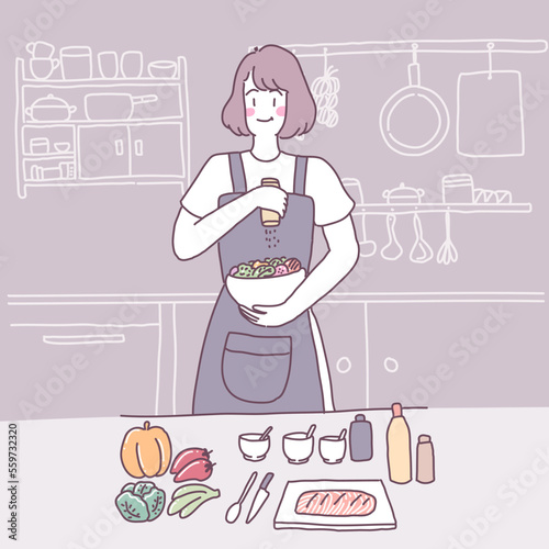 Vector flat illustration with a girl who cooks in the kitchen