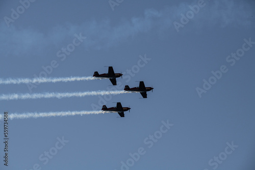 Fototapeta Naklejka Na Ścianę i Meble -  aerobatics on sports planes over the sea in the sky of Jordan