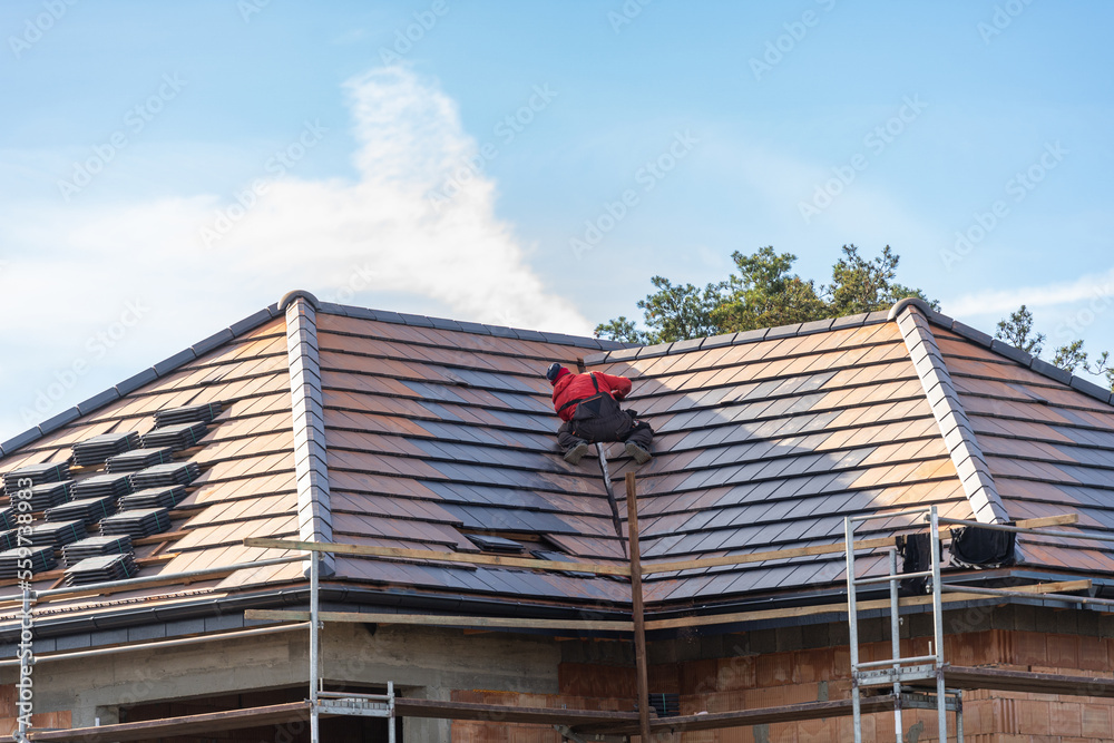 new shingle rooftop of house under construction new shingle rooftop of house under construction