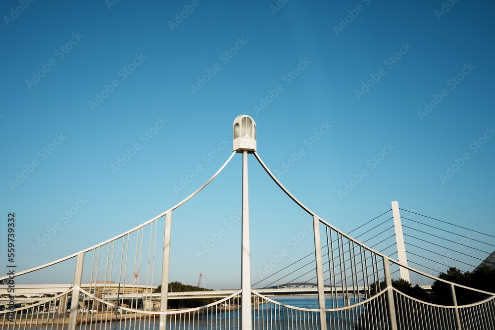 Fototapeta premium suspension bridge over sky