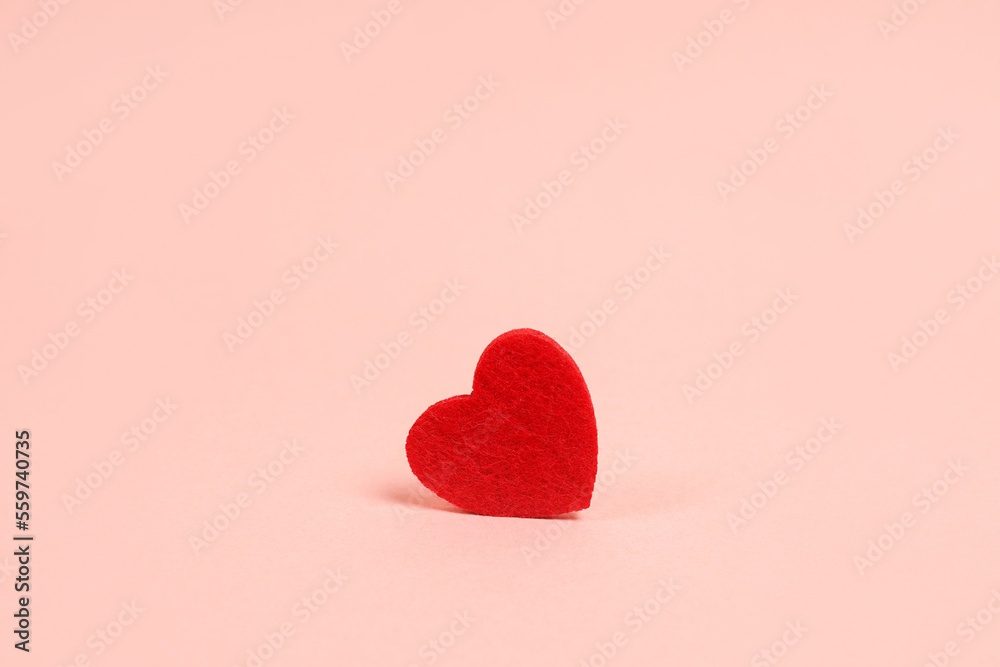 Red heart on pink background. space for text Red heart on pink background. space for text