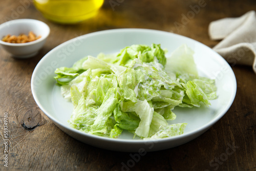 Healthy leaf salad with yogurt dressing