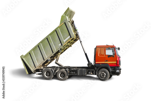 Large dump truck car with a raised body on a white isolated white background. Car for transportation of heavy bulk cargo. Construction equipment. Element for design. photo